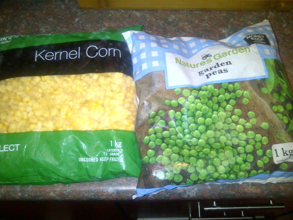 Add 2 cups of frozen corn, it can be either sweet or regular corn. Also add 2 cups of frozen peas